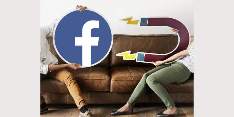 Two people holding facebook and magnet icons